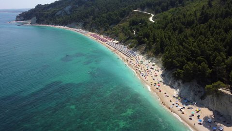 4K aerial reveal shot of beach in Marche region, near Ancona city, Italy 