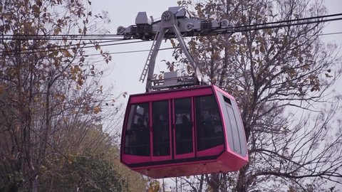 Guwahati ropeway - A cable car or rope way or gondola carrying passenger in guwahati, Assam India. It is India's longest ropeway