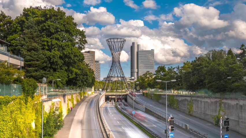 Skyscrapers munich germany hyperlapse timelapse video in 4k. Mae West is a sculpture in Munich-Bogenhausen designed by Rita McBride, munich skyline with buildings businnes dusctrict munchen.