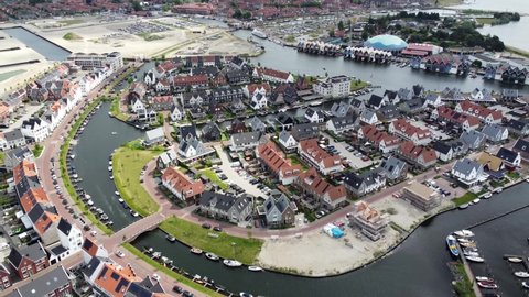 Aerial view of new neighborhood located in Harderwijk it is a municipality and city almost at the exact geographical centre of the Netherlands and on the western boundary of the Veluwe 4k quality