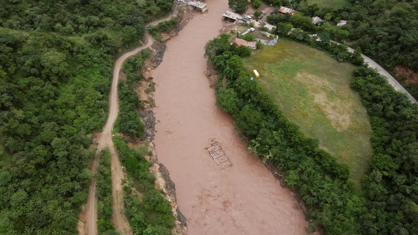 An aerial view of the Rio Grande river in Chiquimula, Guatemala on a rainy season