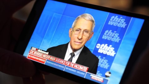 1 August 2021: Watching  Dr. Anthony Fauci Speaking about Delta Variant at ABC News, on a Smartphone in hand