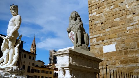 Fountain of Neptune and Lion marzocco on Piazza della Signoria in front of the Palazzo Vecchio, Florence, Italy