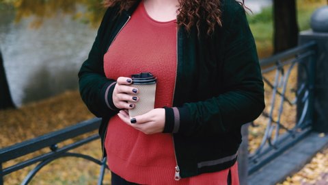coffee to go take away drink park obese woman fall