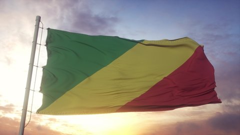 Republic of the Congo Flag waving in the wind, sky and sun background