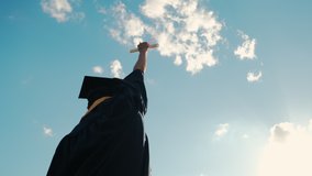 View of the university graduates student at Silhouette sunset goes on the road. Slow motion shot  - Powered by Shutterstock - Get 15% off with code: PIKWIZARD15