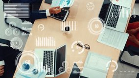 Creative visual of business people in corporate staff meeting . Concept of digital technology for marketing data analysis and investment decision making . - Powered by Shutterstock - Get 15% off with code: PIKWIZARD15