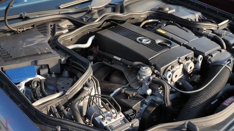 Minsk, Belarus - August 1, 2021: Modern compact supercharged 4-cylinder engine of Mercedes-Benz car.