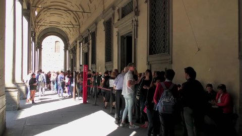 FLORENCE, ITALY - APRIL 21, 2015: Unidentified people at the entrance of the Uffizi Gallery on April 21, 2015, in Florence, Italy. Uffizi Gallery is one of the most famous art museums in the world.