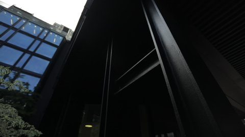 Black steel columns in a modern structure building. Roughed texture