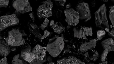 Super Slow Motion Shot of Coal Explosion Isolated On Black Background at 1000 fps.