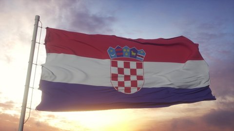 Flag of Croatia waving in the wind, sky and sun background