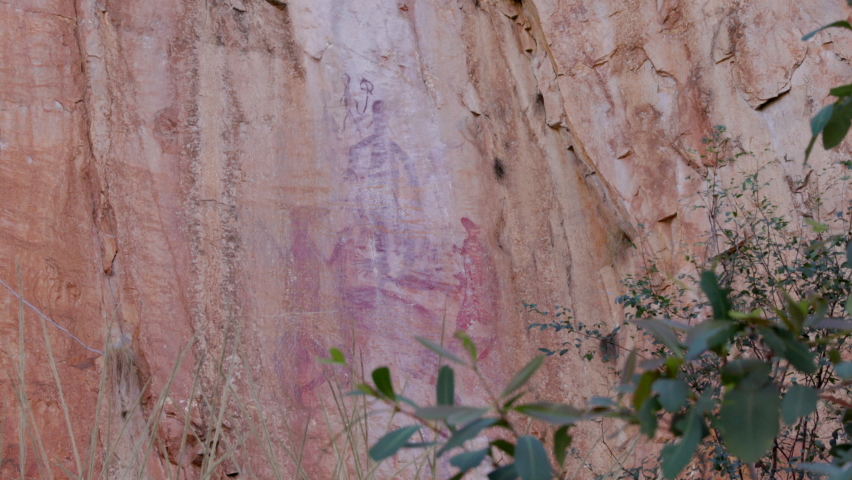 low angle shot of aboriginal rock art at nitmiluk gorge, also known as katherine gorge of nitmiluk national park in the northern territory Royalty-Free Stock Footage #1077040574