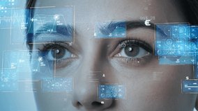 Young woman watching hologram screens. Biometrics concept. Personal authentication. - Powered by Shutterstock - Get 15% off with code: PIKWIZARD15