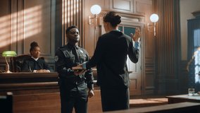 Law and Justice Court Case Witness Solemnly Swears that the Evidence She Shall Give Shall be the Truth and Nothing but the Truth Before Testifying to Lawyers and Judge in Courthouse. - Powered by Shutterstock - Get 15% off with code: PIKWIZARD15