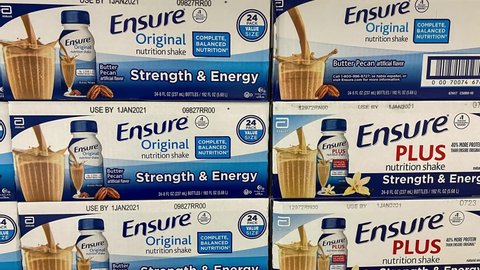 Orlando, FL USA - February 11, 2020:  Zooming in on cases of Ensure nutrition shakes at a Sams Club  in Orlando, Florida.