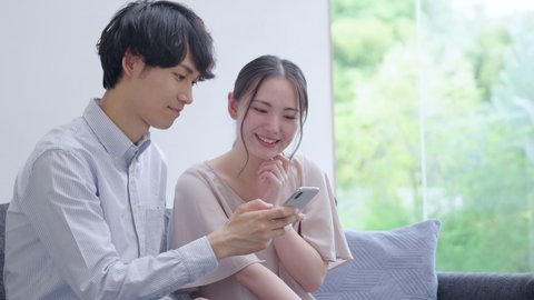 Young couple using a smartphone