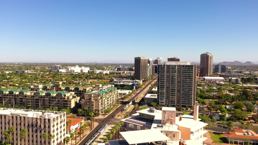 Drone Flying Over High-rise Buildings In Phoenix On A Sunny Summer Day In Arizona, USA. - aerial
