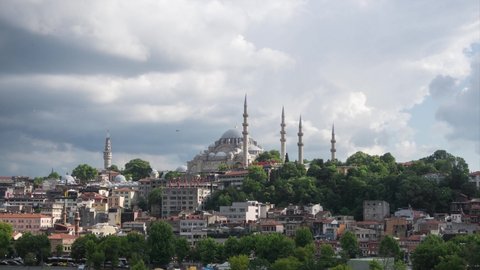 Suleymaniye Mosque and Suleymaniye district at sunny cloudy day zoom in timelapse