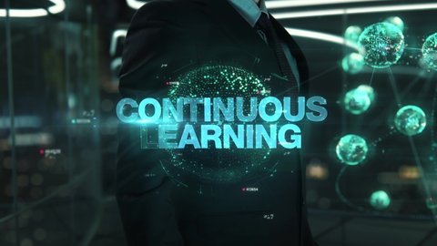 Businessman with Continuous Learning hologram concept