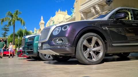 Monte-Carlo, Monaco - August 5, 2021: 8K Bentley Bentayga VS Rolls-Royce Cullinan, Two Luxury SUV Car Parked In Front Of The Monte-Carlo Casino In Monaco On The French Riviera, Europe - 8K UHD 