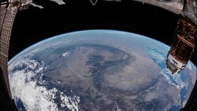 Beautiful 4K time lapse of Earth seen from space through a fish eye lens. Image courtesy of NASA.