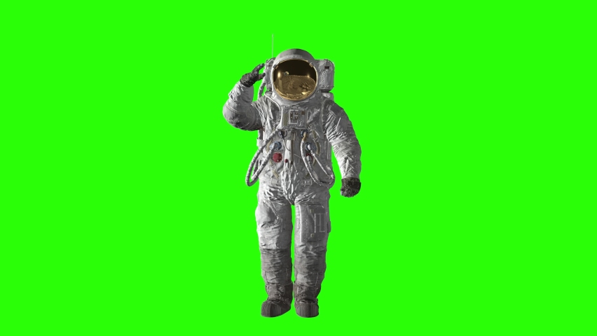 Lunar Astronaut saluting on the Green Screen. Royalty-Free Stock Footage #1077148547