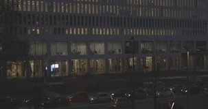 Contemporary architecture business district building facade, tilt up, night shot, 4K