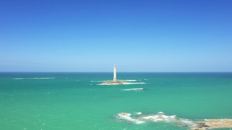 The Lighthouse of Cap de la Hague in France, in Normandy, in the Cotentin, towards La Hague and Cherbourg, at the edge of the Channel Sea.