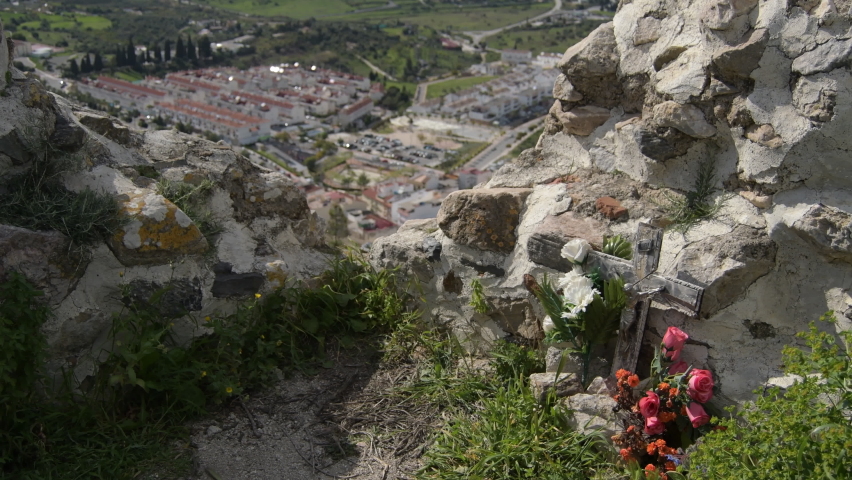 Little cult religious place in the hill with the town below, Cártama, Spain