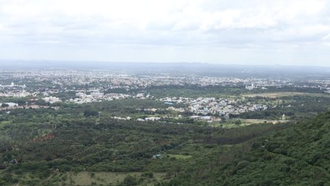 Mysuru, Karnataka, India-August 4 2021;An High angle view of the famous city of Mysuru as seen from the Chamundi Hills during the monsoon season in Karnataka, India.