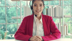 Video call camera view of businesswoman talks actively in videoconference . Call center, telemarketing, customer support agent provide service on telephone video conference call.
