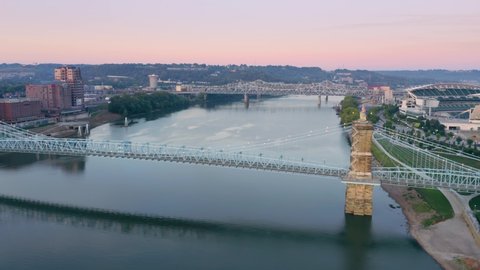 Aerial: Purple People Bridge crossing the Ohio River at sunrise, Ohio, USA. 