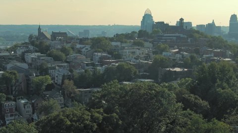 Aerial: Downtown Cincinnati city skyline from Mount Adams, Ohio, USA . 21 September 2019