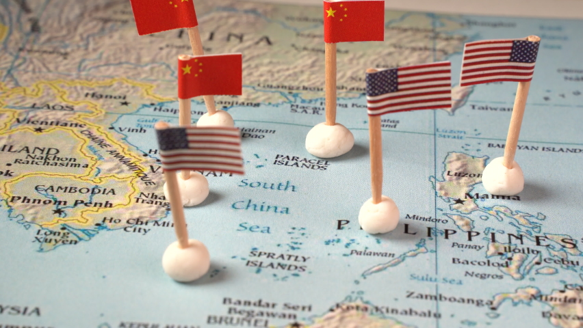 flags of china and the united states on a map of the south china sea. Concept of the south china sea diplomatic conflict Royalty-Free Stock Footage #1077205685