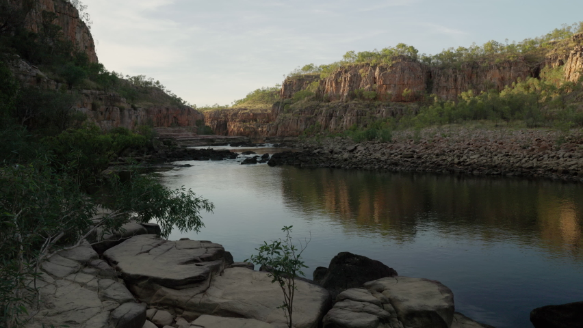 sunrise wide shot of first gorge rapids at nitmiluk gorge, also known as katherine gorge at nitmiluk national park in the northern territory Royalty-Free Stock Footage #1077236207