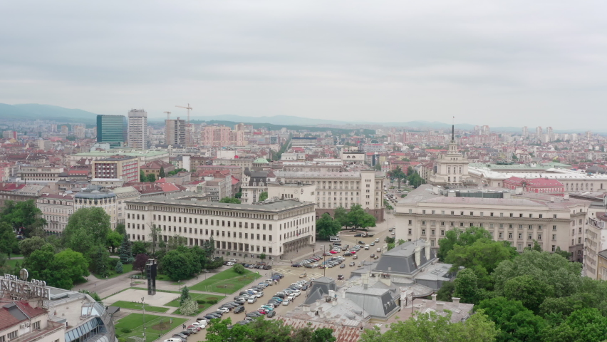 Central square of the city of Sofia, Bulgaria. Aerial view of the city center with park, heavy traffic and city buildings