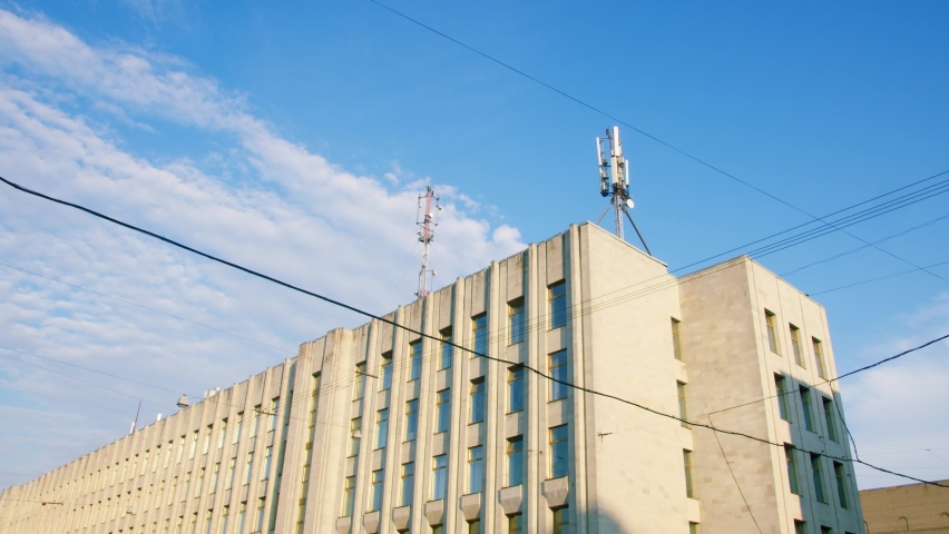 Internet and mobile network 4G, 5G. antenna on the roof of the building in the city. global communication network
