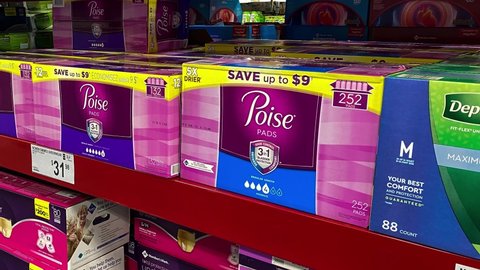Orlando, FL USA February 11, 2020: Panning right on the Poise adult diaper aisle at a Sams Club store.