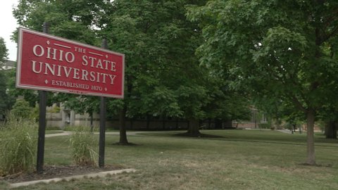 COLUMBUS, OH - Circa August, 2021 - A daytime establishing shot of the Ohio State University sign on campus.  	