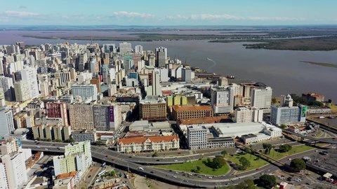 Porto Alegre, Rio Grande do Sul, Brazil - 08.03.2021 - Aerial view of famous avenue and buidings of downtown city of Porto Alegre, state of Rio Grande do Sul, Brazil.  Buildings at coast avenue.