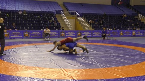 Orenburg, Russia - 17 October 2020: Young men compete in the sports wrestling at the All-Russia Sports Wrestling Tournament for the prizes of the Governor of Orenburg Region