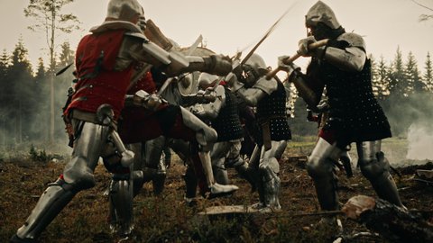 Epic Battlefield: Armies of Medieval Knights Fighting with Swords. Brutal Action Battle of Armored Warrior Soldiers. Dark Ages War, Warfare, Crusade. Cinematic Historical Reenactment. Wide Slow Motion