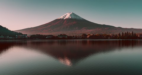 Fall season: Timelapse of Fuji mountain with lake reflection at dawn, Japan