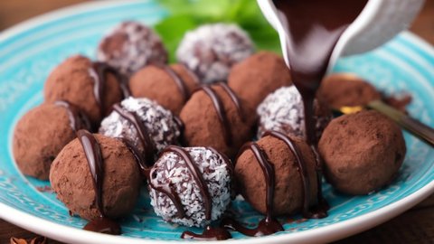Homemade Chocolate Truffles Coated In Cocoa Powder And Coconut Flakes Decorated With Dark Chocolate Glaze. Confection, Sweet Food