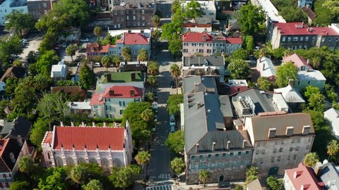 Old historic Charleston SC. Descending aerial. Tilt up reveal.