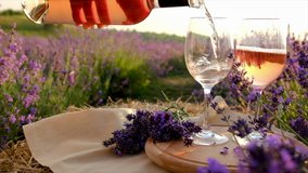 Picnic wine in a lavender field. Selective focus. - Powered by Shutterstock - Get 15% off with code: PIKWIZARD15