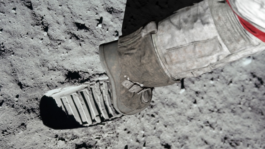 Lunar astronaut walking on the moon's surface and leaves a footprint in the lunar soil. 3d rendering. Some Elements of this video furnished by NASA. | Shutterstock HD Video #1077325421