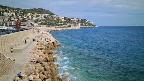 Nice, France - August 3, 2021: 8K Seawall Of The Port Of Nice, Concrete Breakwater With Lighthouse. Entrance To The Port Of Nice On The French Riviera, France, Europe - 8K UHD (7680 x 4320)