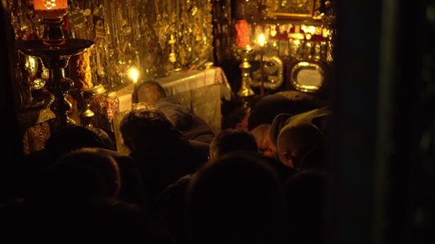 Mount Athos, Greece - 22 Noe, 2019: Orthodox priests, monks and believer people take part in a mass in church in Docheiariou (Dochiariou) monastery at Mount Athos